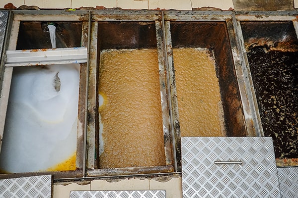 regular grease trap maintenance prevents grease and oil from entering the sewage system, ultimately protecting the environment